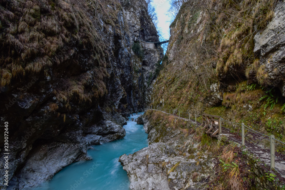 Tolmin Gorge (Tolminska Korita, Korita Tolminke) is a narrow canyon in Julian Alps, close to Tolmin, Soča Valley, Slovenia. Within the gorge is a clear stream with a number of rapid and waterfalls. 