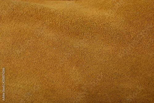 Genuine brown leather and suede leather background