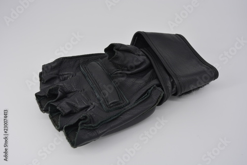 Black men's leather gloves for sport and training, sporting events, boxing and mixed sports, sport and the power of men © Daria Katiukha