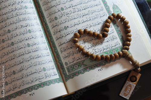 The holy Quran with rosary beads