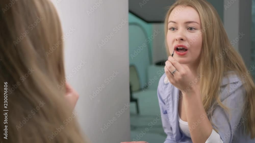Pretty Woman Applying Lipstick Getting Ready For Studio Shooting Pretty Woman Applying Lipstick Getting Ready For Studio Shooting