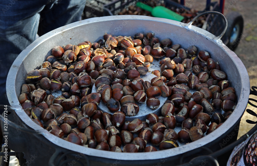 Chestnuts baked at an autumn fair Chestnuts baked at an autumn fair
