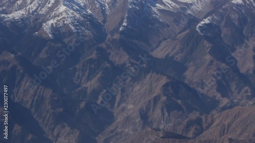 Bird's eye view of the snow covered mountain peaks