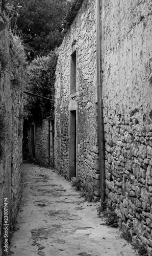 An alleyway in the historic village of Vodnjan (also called Dignano) in Istria, Croatia 