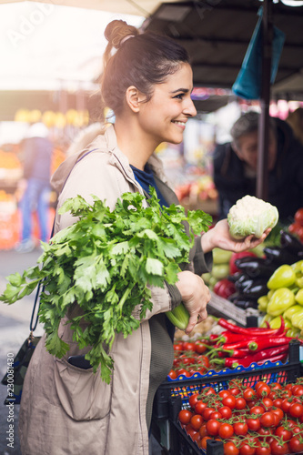 Woman on greenmarket in the city