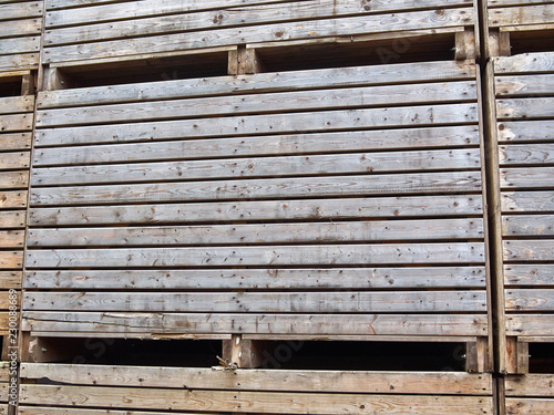 Big pile stack of wooden packing storage wooden crates boxes