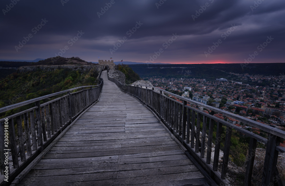 Fototapeta premium Old fortress at sunset. A sunset view of the medieval fortress Ovech near Provadia, Bulgaria