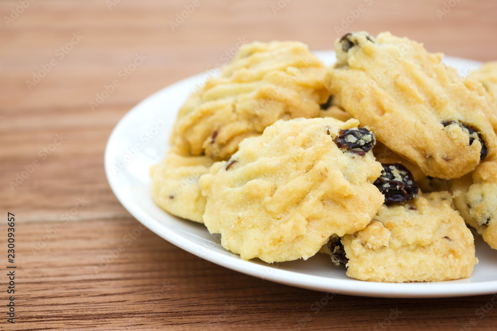 Closeup butter cookies on white plate. Sweet dessert.