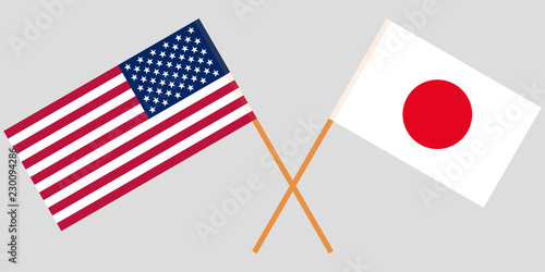 The crossed Japan and USA flags. Official colors. Vector