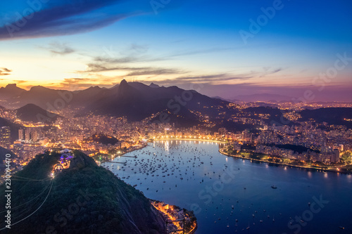 Aerial view of Rio de Janeiro at night with Urca and Corcovado mountain and Guanabara Bay - Rio de Janeiro, Brazil photo