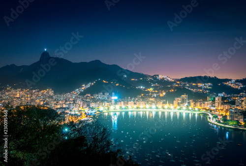 Aerial view of Rio de Janeiro and Guanabara Bay with Corcovado Mountain at night - Rio de Janeiro, Brazil