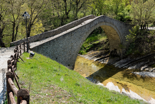 View of the restored traditional stone bridge of Chrysavgi in Thessaly, Greece