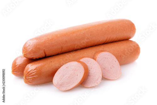 Three sausages with ​​slices isolated on white background