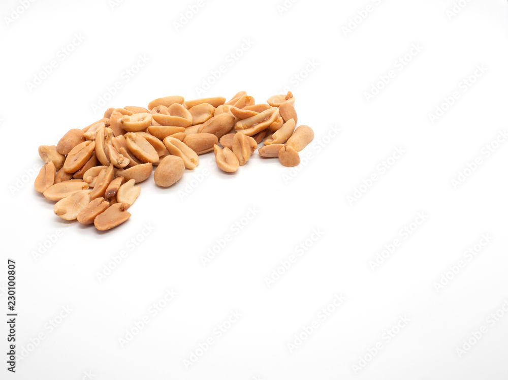 salted peanuts on white background salted peanuts on white background