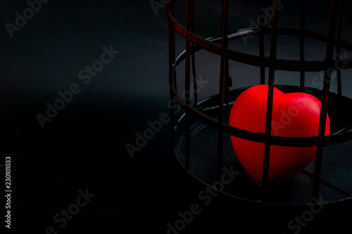 Принти на полотні Broken hearts, loneliness and heartache concept with a lonely heart locked away