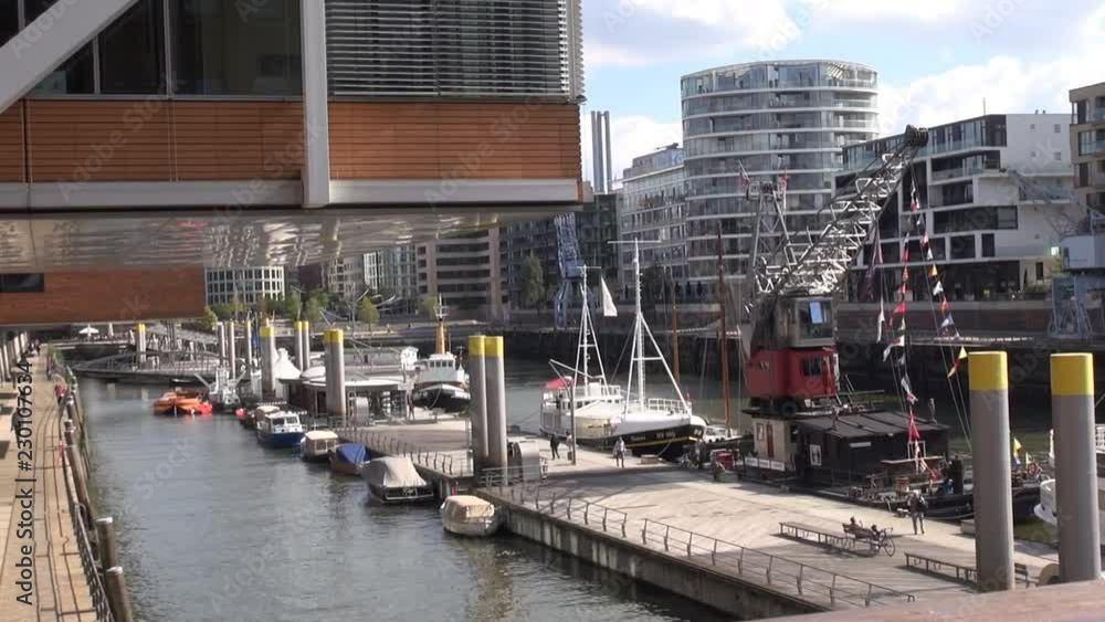 Motion time lapse: Tradition harbor at Sandtorkai, in the quarter Hafencity, Hamburg, Germany Motion time lapse: Tradition harbor at Sandtorkai, in the quarter Hafencity, Hamburg, Germany