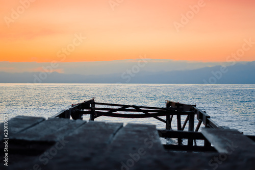 wooden pier at sunset