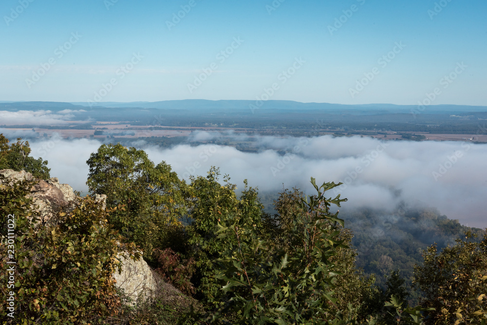 Morning Clouds Over Valley Seen from Above