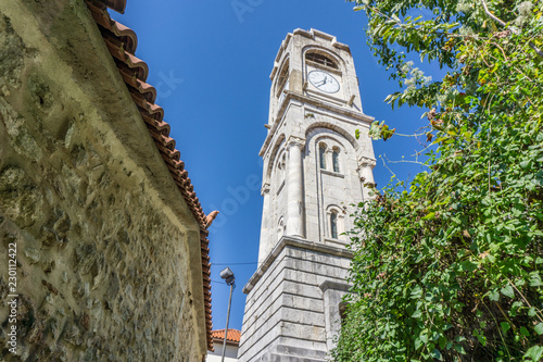 Clock tower of Dimitsana village, a popular winter destination in mountainous Arcadia in Peloponnese, Greece photo