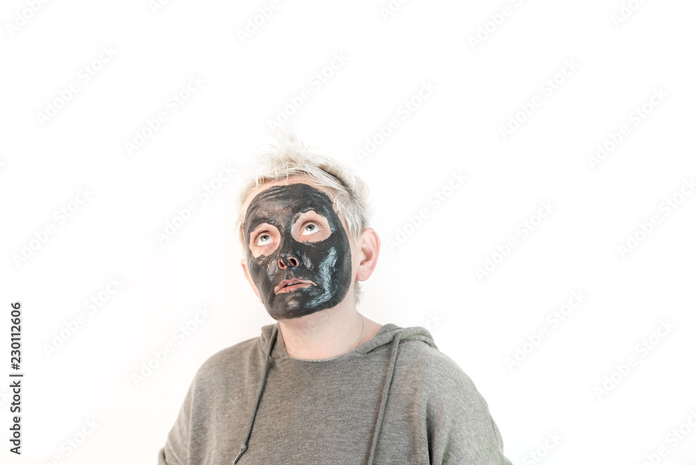 show pure emotions - face of a woman with a black mask 
