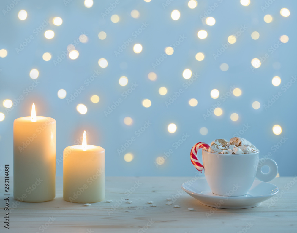 hot chocolate with marshmallow on blue background hot chocolate with marshmallow on blue background