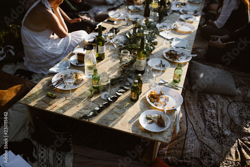 people eating at a floor table