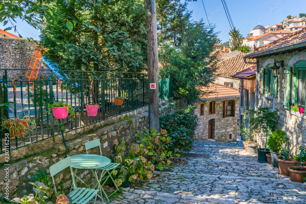 Street view of Dimitsana village, a popular winter destination in mountainous Arcadia in Peloponnese, Greece