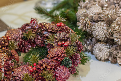 Pine in Pink Christmas door wreath. decoration made of pine , fir and berries.Selected focus