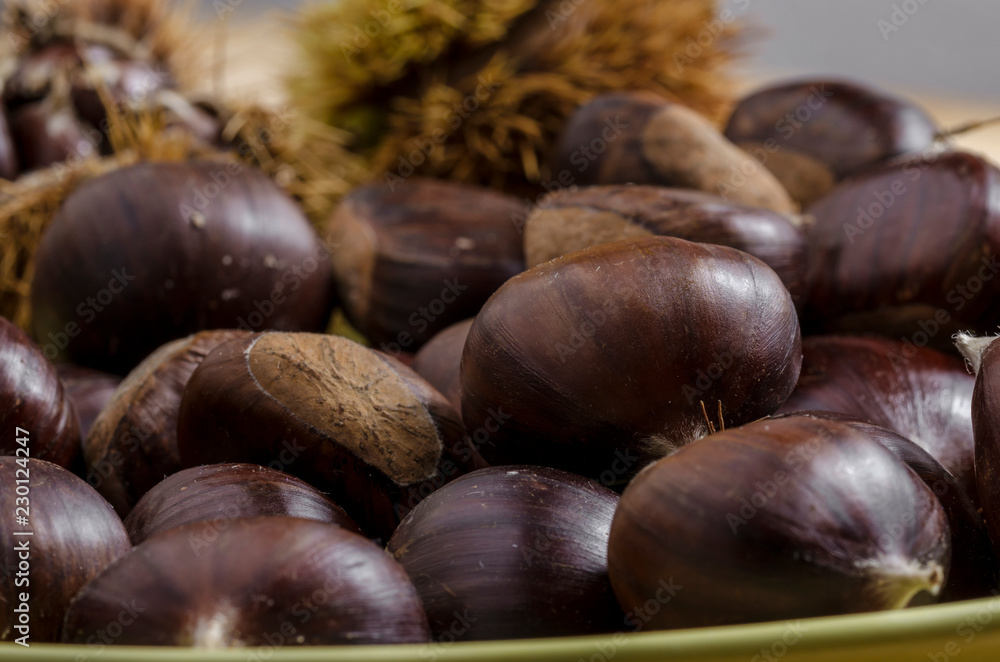 chestnuts and autumn feeling, a dish full of chestnuts. autumn food. chestnuts and autumn feeling, a dish full of chestnuts. autumn food.