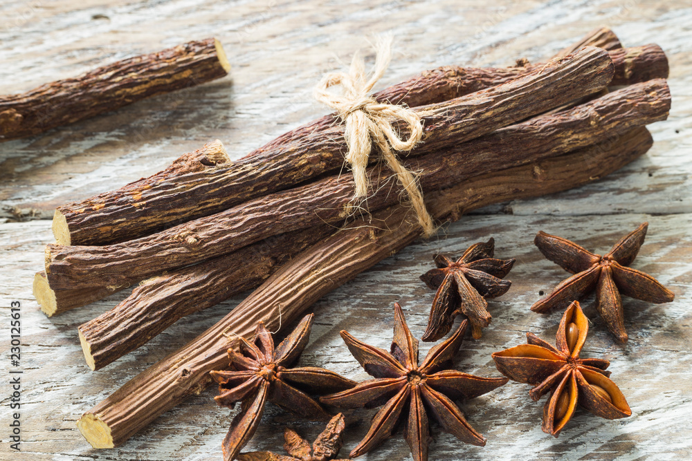 licorice root and anise on the table - Glycyrrhiza glabra licorice root and anise on the table - Glycyrrhiza glabra