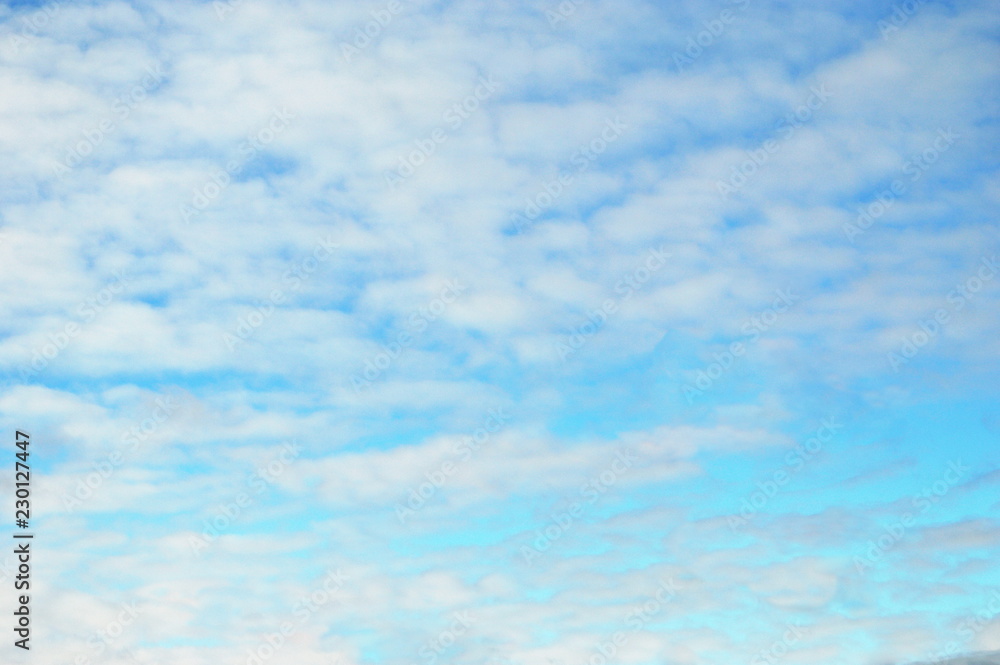 Scenic clouds in blue sky. Good weather in heaven - Beautiful skies. Bright cumulus. Natural atmosphere. Scenic clouds in blue sky. Good weather in heaven - Beautiful skies. Bright cumulus. Natural atmosphere.
