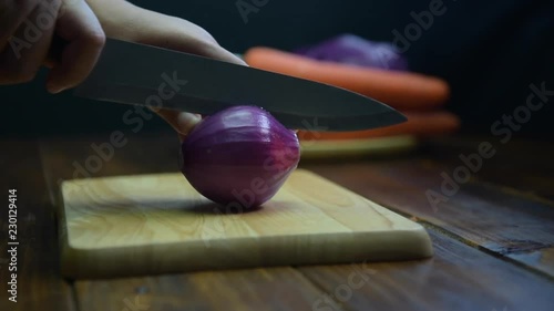 Shallot cut Shooting on the detail of the shallot cut. Cutting Shallots on Wooden Board