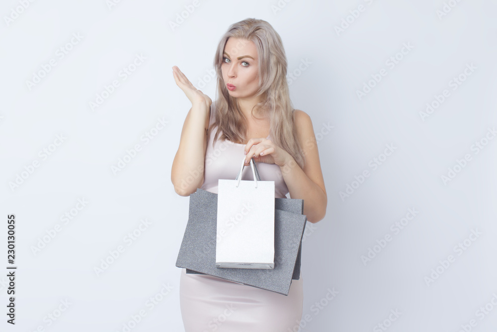 Naklejka premium Shopping woman with bags in her hands