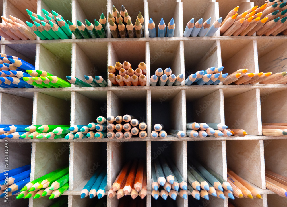 Large pile of wooden colored pencils