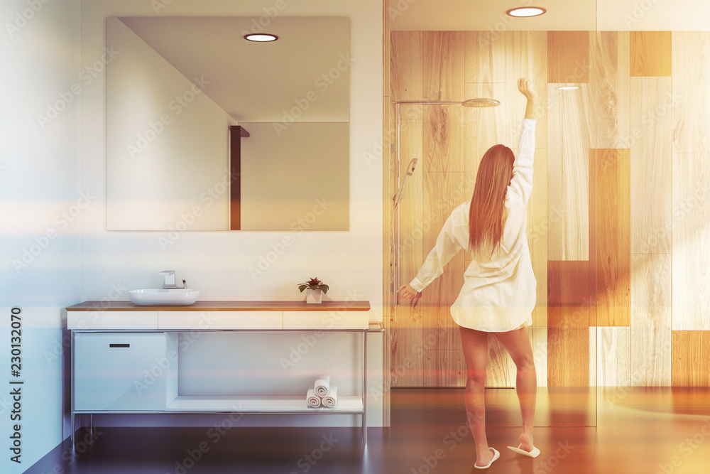 Wooden wall bathroom, sink and shower, woman Wooden wall bathroom, sink and shower, woman
