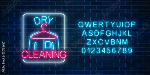 Neon dry cleaners glowing sign with hanger and shirt with alphabet. Cleaning service signboard design.
