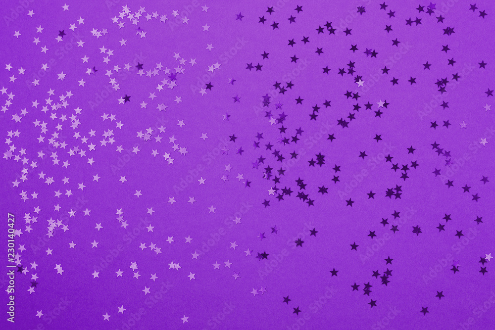 Beautiful festive ultra violet background with metallic star shaped confetti. Holiday or decoration concept. Beautiful festive ultra violet background with metallic star shaped confetti. Holiday or decoration concept.