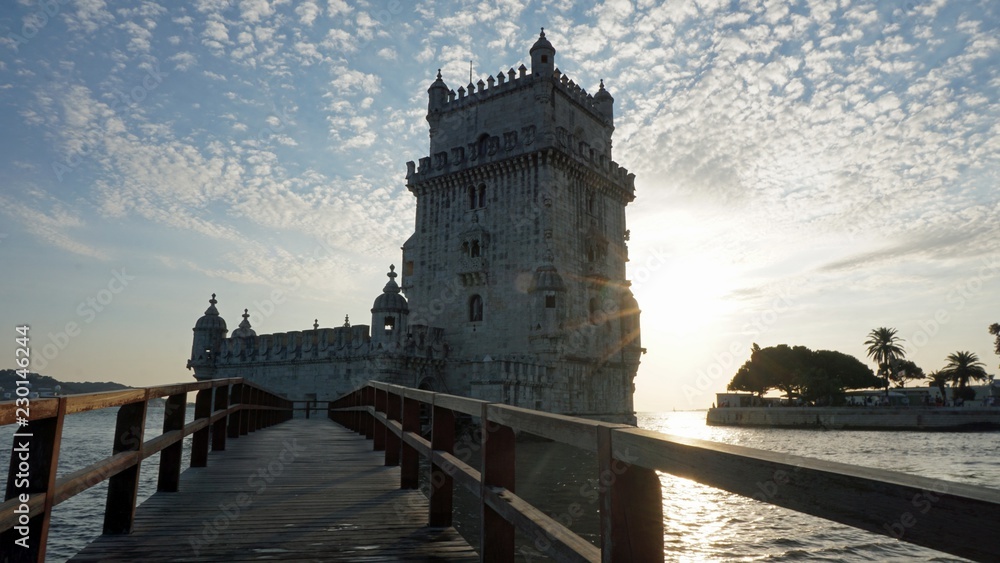 sunset at the tower of belem in lisbon sunset at the tower of belem in lisbon