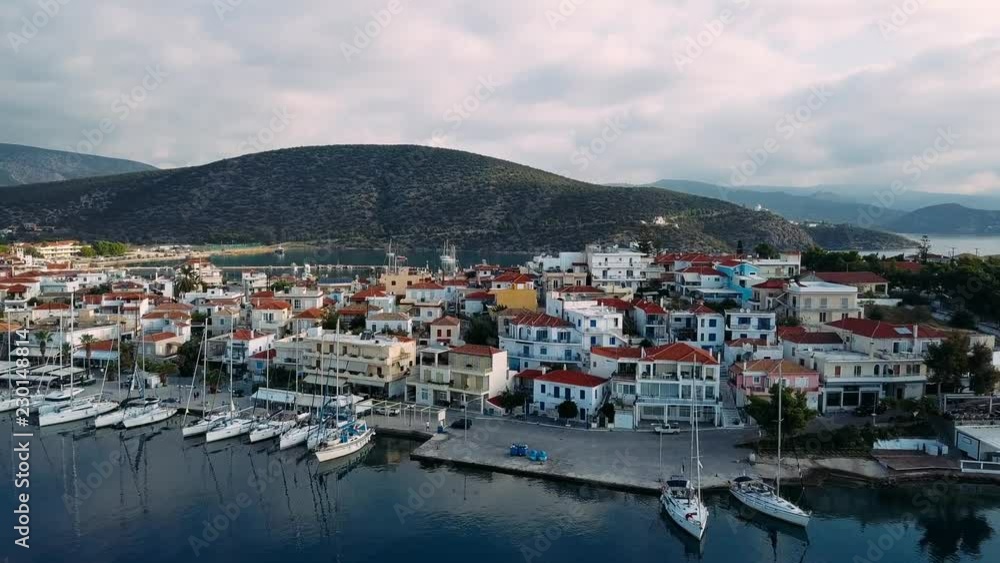 Flying over the marina of Spetses island, one of the Saronic Islands in the Aegean sea, Greece.
Flying over the marina of Spetses island, one of the Saronic Islands in the Aegean sea, Greece.
