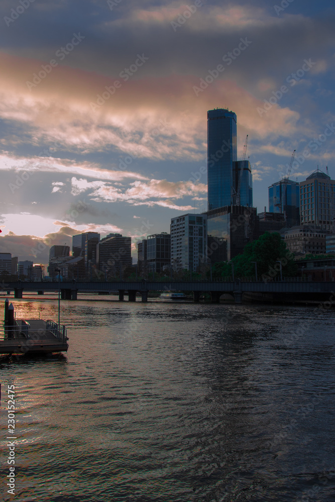beautiful sunset with building and river in melbourne city australia