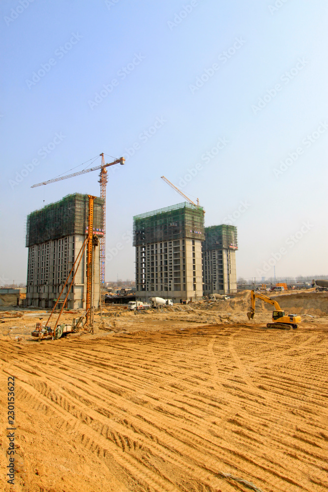 high rise residential construction site in a city