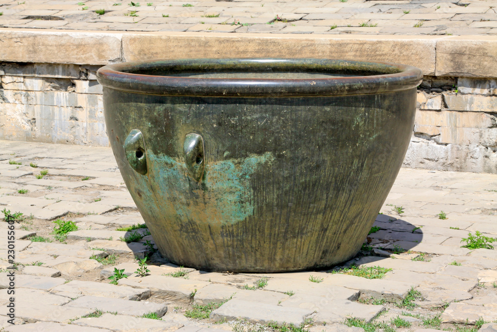 Copper cylinder in broken ground in the Eastern Royal Tombs of the Qing Dynasty, china Copper cylinder in broken ground in the Eastern Royal Tombs of the Qing Dynasty, china