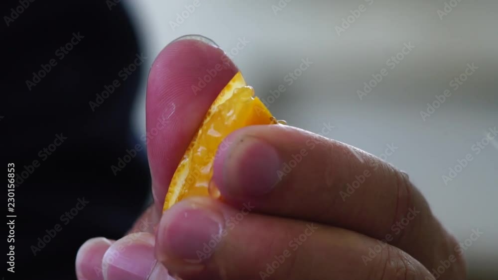 Slow Motion of Fresh Orange  Squeeze and Rotating