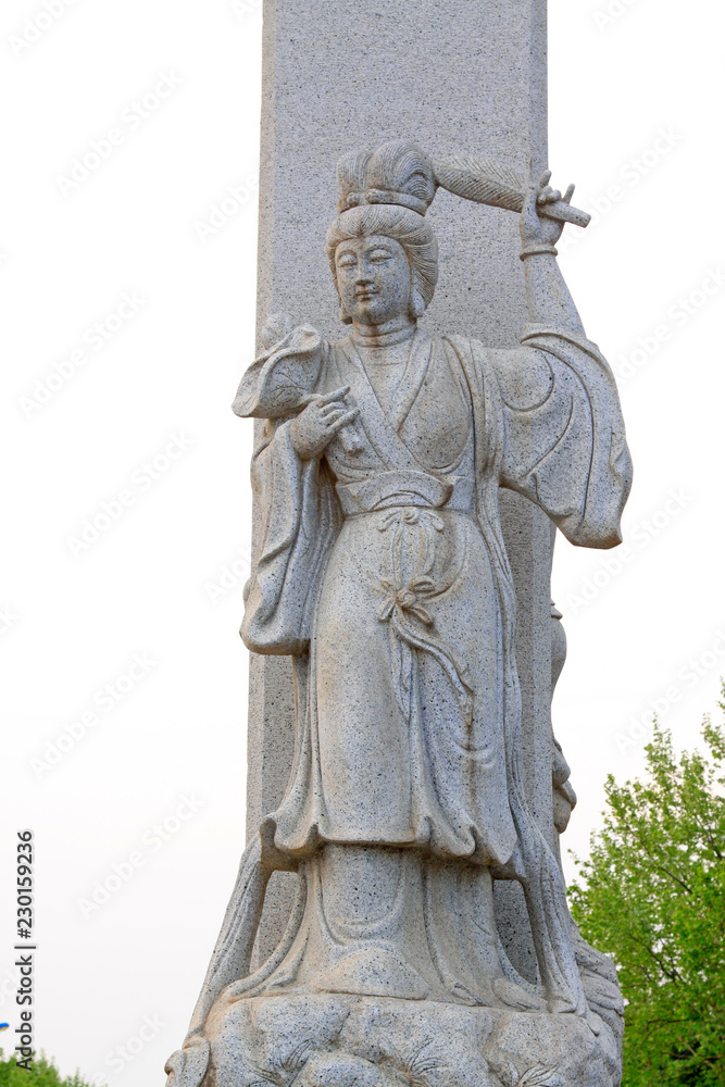 Obraz premium Nanshan Giant Buddha scenic area figure stone carving, china