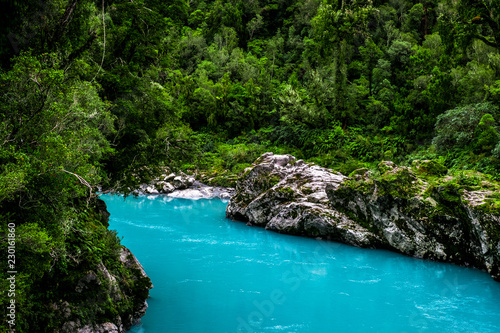 Hokitika Gorge  West Coast  New Zealand. Beautiful nature with blueturquoise color water and wooden swing bridge.