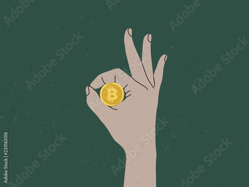 Hand making OK sign around bitcoin, bitcoin is good currency concept