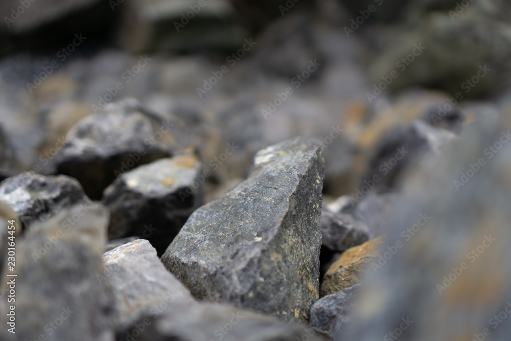 Rock pile, rubble tailings, close with shallow depth of field Rock pile, rubble tailings, close with shallow depth of field