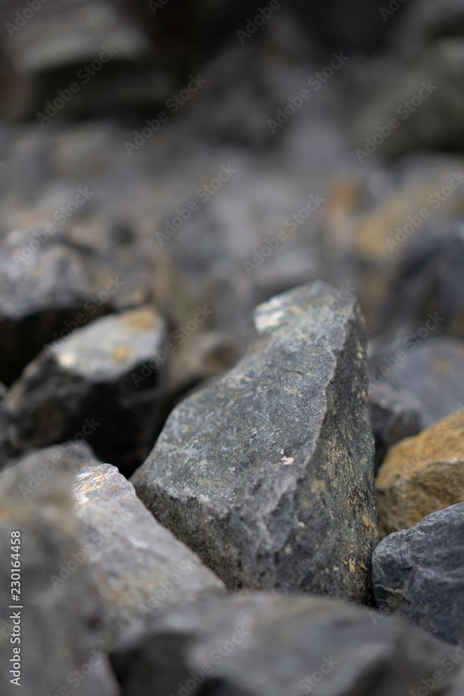Rock pile, rubble tailings, close with shallow depth of field Rock pile, rubble tailings, close with shallow depth of field