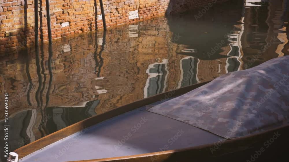 Close-up of boat parked on a canal in Venice Close-up of boat parked on a canal in Venice