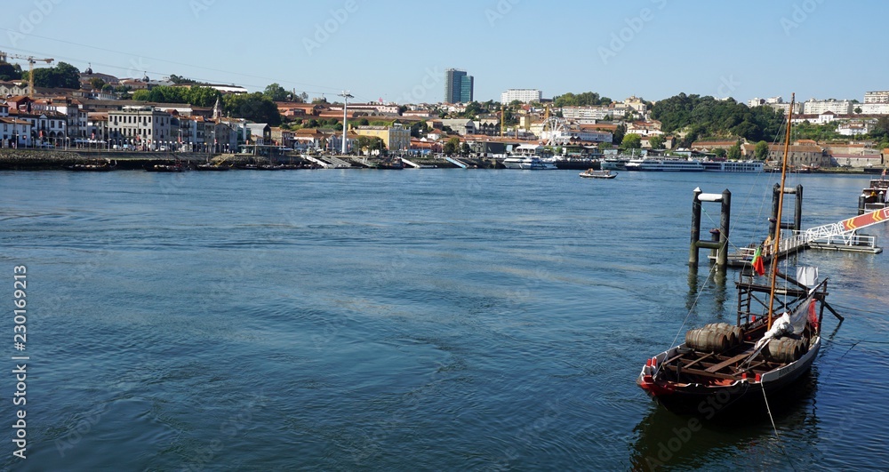 douro river in porto with colorful traditional boats